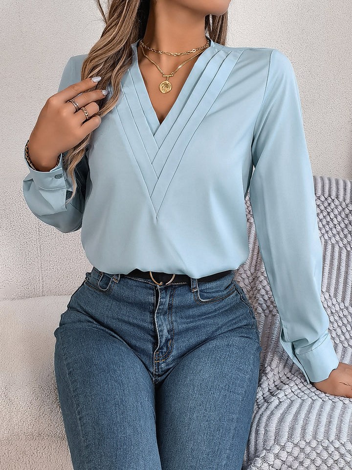 Lizzy – The Elegant V-Neck Blouse