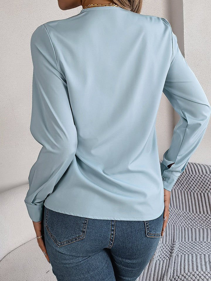 Lizzy – The Elegant V-Neck Blouse